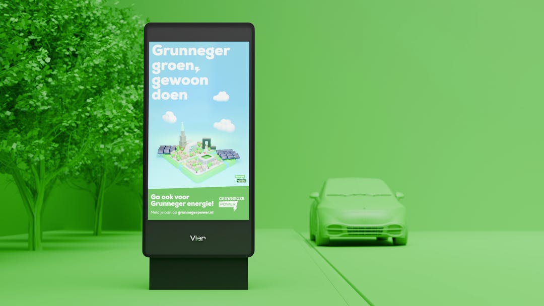 Een Digital Out of Home reclame-scherm die een Grunneger Power reclame uitbeeldt